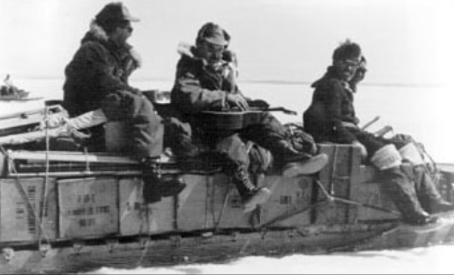 J. Norman Emerson (seated in the middle, to the right of Bill Taylor) twice served on Arctic field expeditions to northwestern Hudson Bay, first in 1954 and again in 1955. 